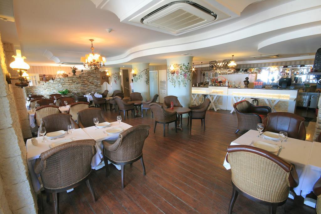Trilyali Butik Hotel Tirilye Екстер'єр фото